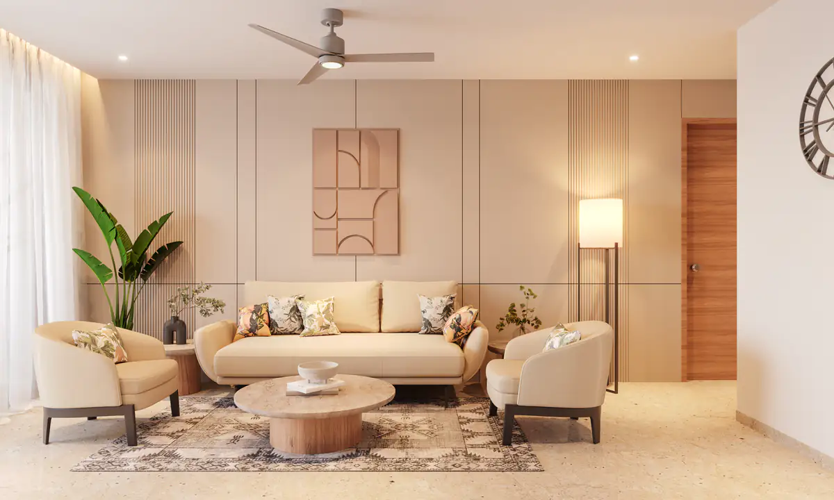 Living room with a cream sofa, round coffee tables and a wood-panelled wall